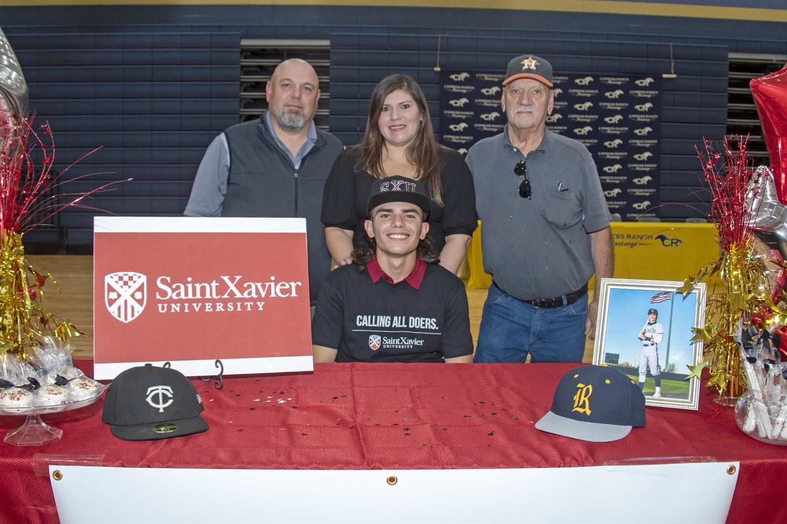 Cypress Ranch senior Connor Nicholas, seated, signed a letter of intent to play baseball at the Saint Xavier University.